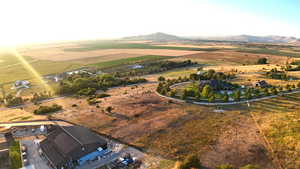 Aerial view of sparsely populated area with a mountainous background