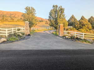 View of road with a mountain view and a view of countryside