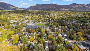 View of property location featuring a mountainous background and nearby suburban area