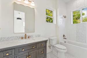 Full bath with shower / bath combination and vanity