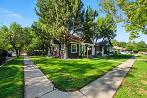 View of front of house with a front yard