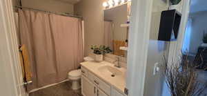Bathroom with vanity and toilet