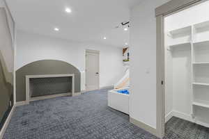 Rec room featuring recessed lighting and carpet