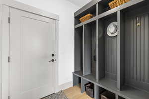 Mudroom featuring light wood-style flooring