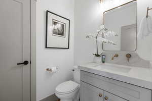 Bathroom with vanity and toilet