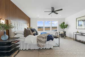 Living room with light carpet and ceiling fan