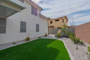 View of fenced backyard