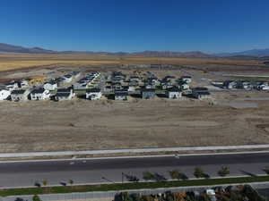 Aerial perspective of suburban area with mountains