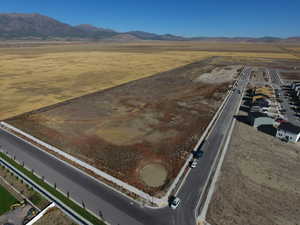 Aerial view of property's location featuring mountains and rural landscape
