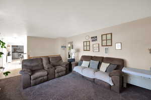 Tiled living area with carpet floors