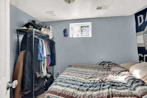 Storage room with a bed