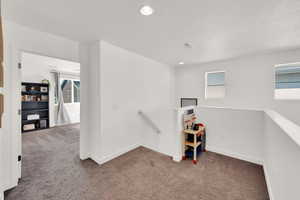 Game room featuring carpet flooring and recessed lighting