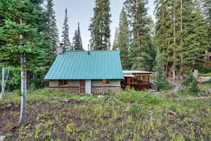View of yard featuring a wooden deck