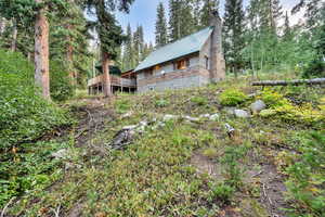 View of yard featuring a wooden deck