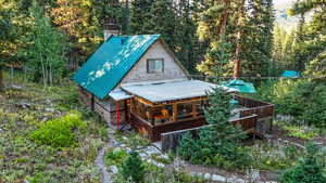 View of exterior with a forest view