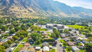 Aerial perspective of suburban area with a mountain backdrop