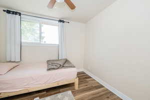 Bedroom featuring wood finished floors and ceiling fan