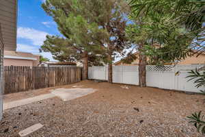 View of fenced backyard