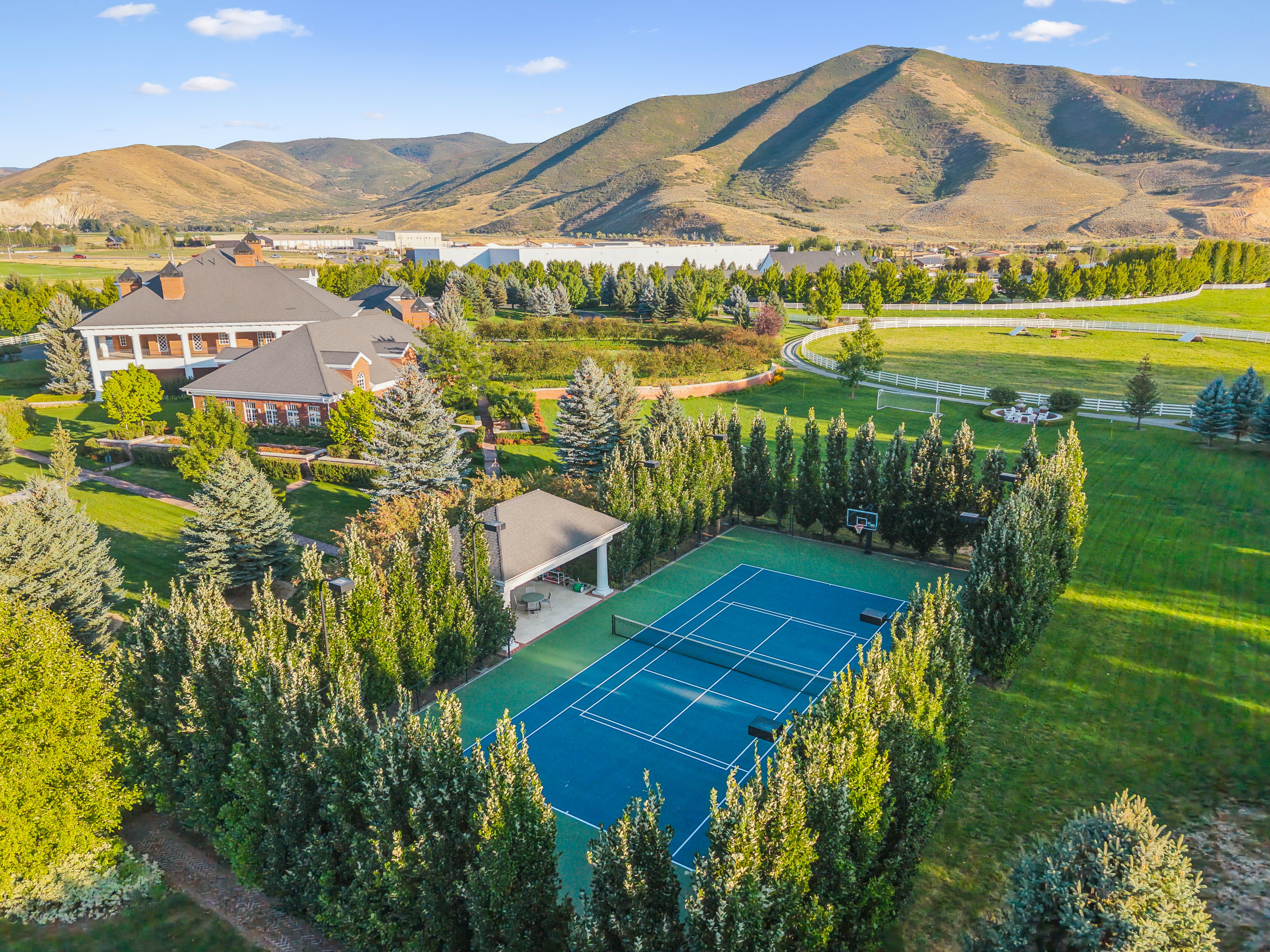 Regulation-size tennis court with blue and green surfacing