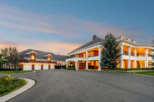 View of building exterior with asphalt driveway