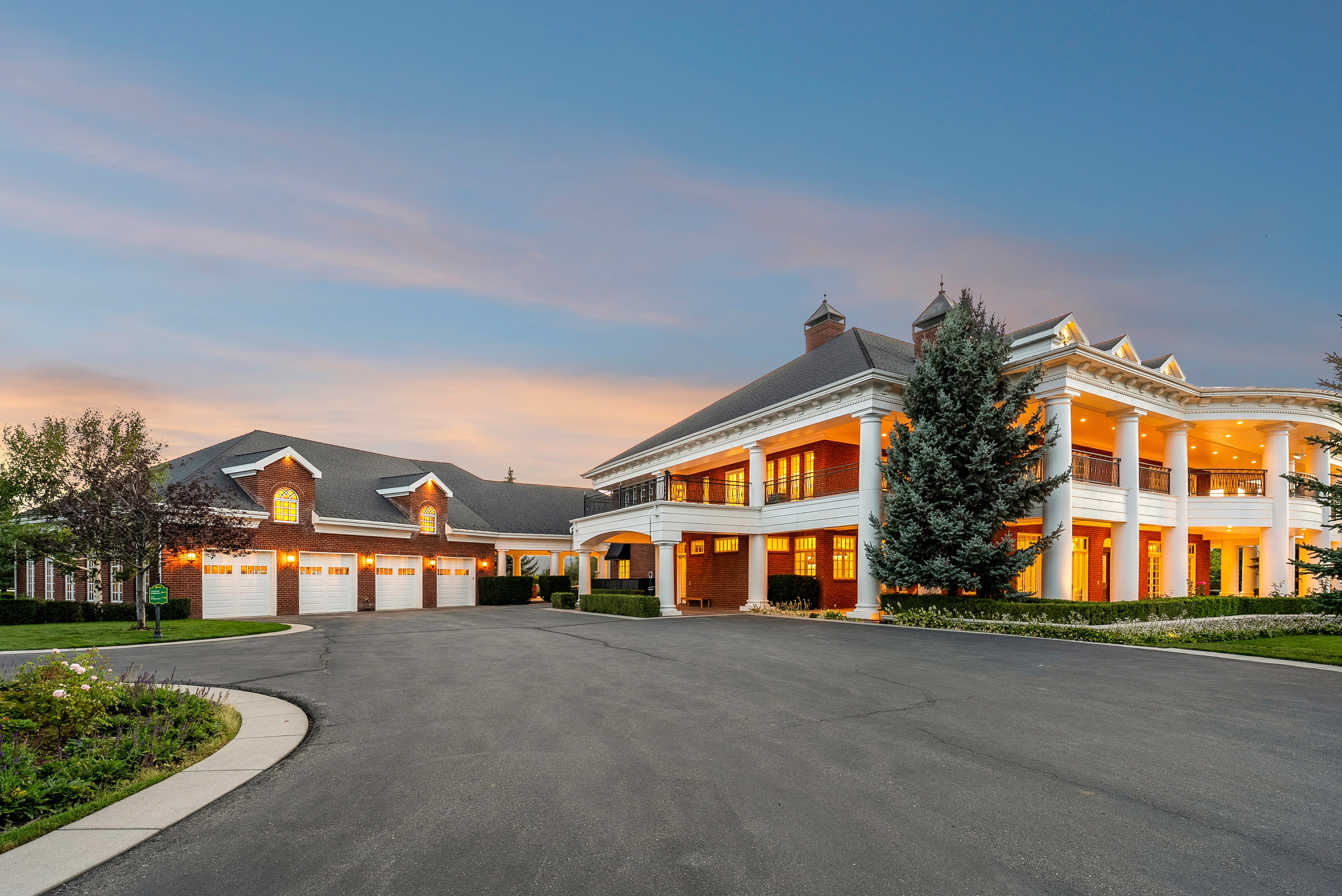 Expansive brick exterior with a grand columned facade