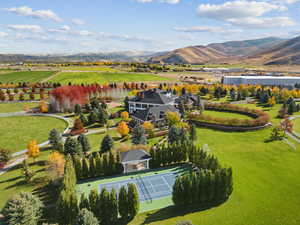 Aerial view of sparsely populated area with a mountainous background