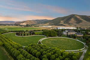 View of mountain backdrop featuring rural landscape