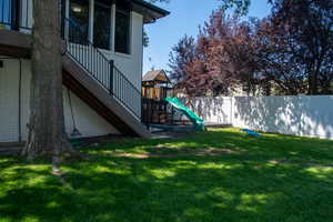 View of yard with a playground