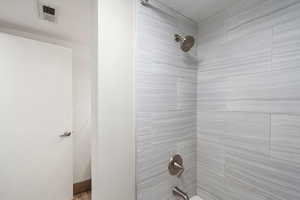Full bathroom with shower / washtub combination