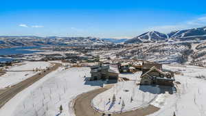 Snowy aerial view with a mountain view
