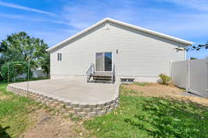 Back of property with a patio area