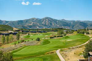 View of property's community featuring golf course view and a mountain view