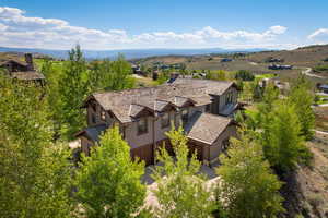 View of subject property with a mountainous background
