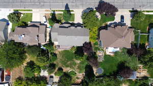 Aerial view of property's location with nearby suburban area
