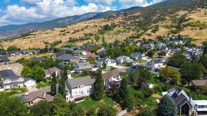 Aerial view of residential area with mountains
