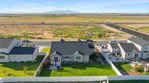 Aerial perspective of suburban area featuring mountains