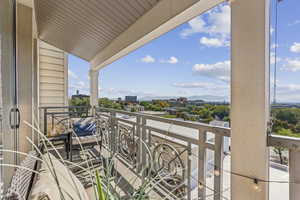Balcony featuring a mountain view