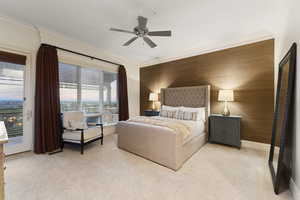 Bedroom featuring light carpet, ornamental molding, access to exterior, and ceiling fan