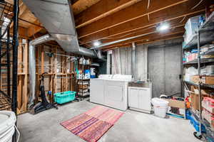 Storage room with washer and dryer