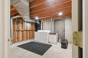 Unfinished basement with independent washer and dryer