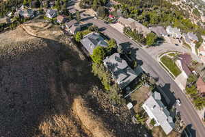 Aerial overview of property's location featuring nearby suburban area