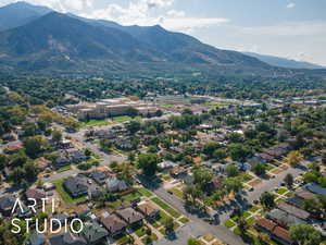 View of property location with a mountainous background and nearby suburban area