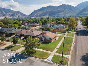 Aerial view of residential area featuring mountains