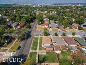 Aerial overview of property's location featuring nearby suburban area
