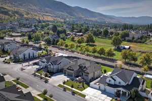 Aerial view of residential area with a mountainous background