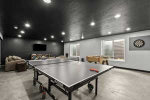 Game room featuring recessed lighting and light colored carpet