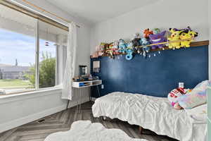 Bedroom featuring baseboards