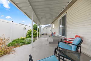 Fenced backyard featuring a patio
