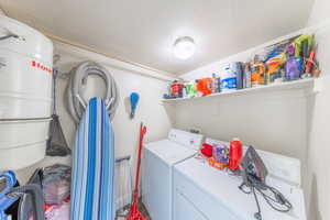 Laundry room with central vac canister.