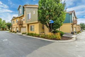 View of side of property with an attached garage